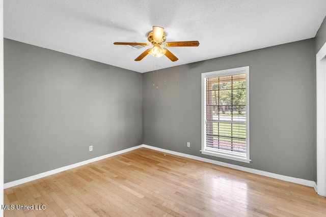 1320 Sally Dr, Picayune, MS 39466 - empty room with a ceiling fan, hardwood / wood-style floors, and baseboards