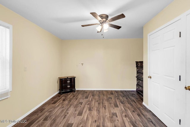 1320 Sally Dr, Picayune, MS 39466 - unfurnished room featuring dark wood finished floors, ceiling fan, and baseboards