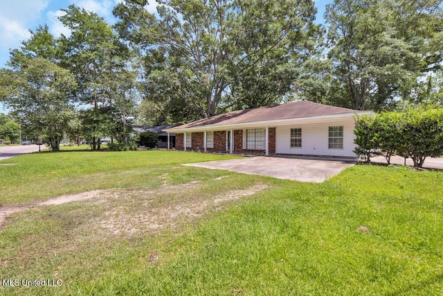 1320 Sally Dr, Picayune, MS 39466 - rear view of property featuring a lawn
