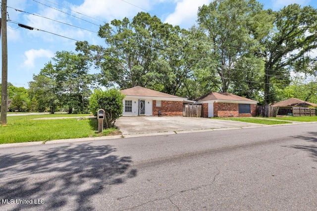 1320 Sally Dr, Picayune, MS 39466 - view of front of home featuring brick siding and driveway