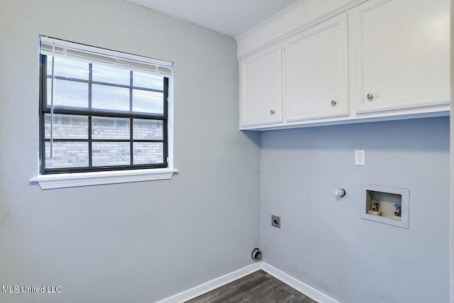 laundry area with electric dryer hookup, cabinet space, hookup for a washing machine, dark wood-style flooring, and baseboards