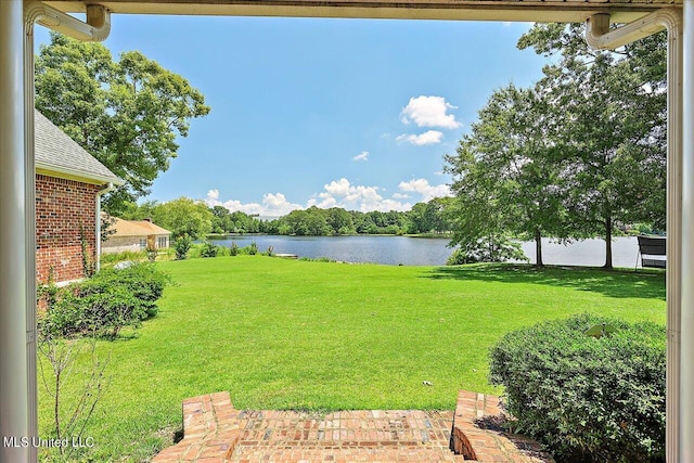 view of yard with a water view