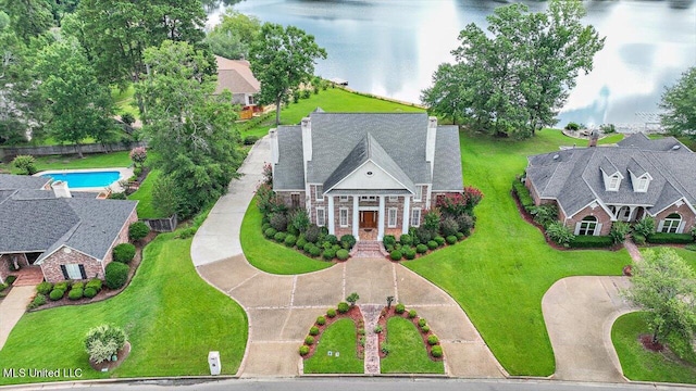 drone / aerial view with a water view