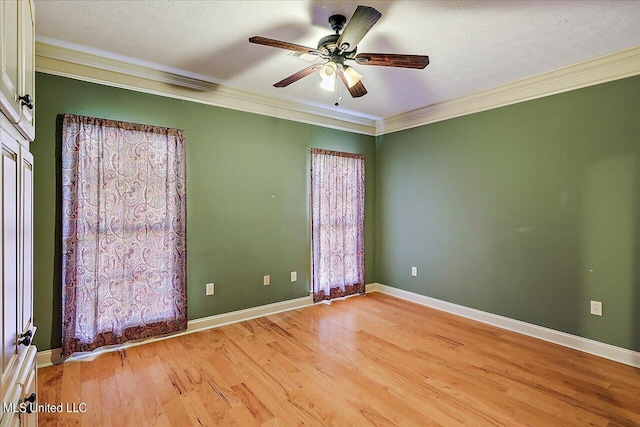 unfurnished room with ceiling fan, a textured ceiling, ornamental molding, and light hardwood / wood-style floors