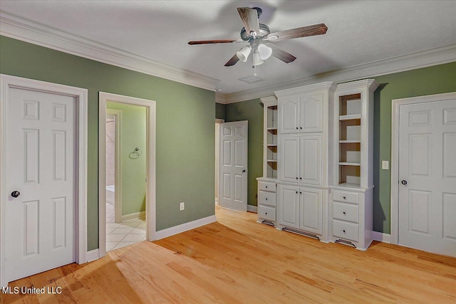 unfurnished bedroom with ceiling fan, crown molding, light hardwood / wood-style flooring, and ensuite bath