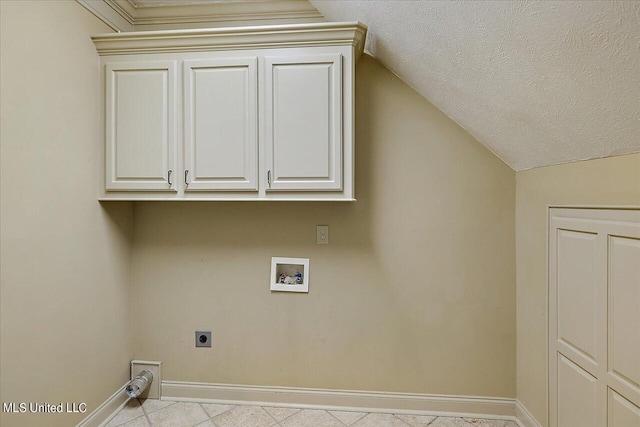 laundry room with cabinets, washer hookup, and hookup for an electric dryer