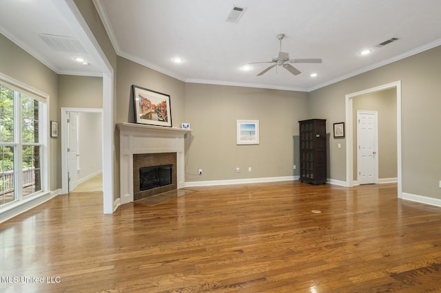262 Geneva Blvd, Madison, MS 39110 - unfurnished living room with a ceiling fan, wood finished floors, recessed lighting, a fireplace, and crown molding