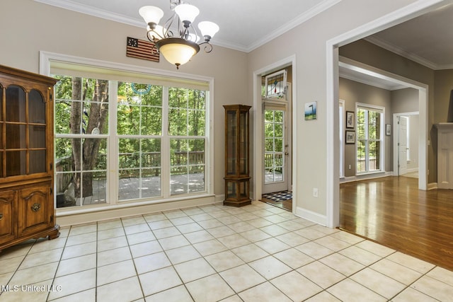 262 Geneva Blvd, Madison, MS 39110 - unfurnished dining area featuring a chandelier, crown molding, and light tile patterned flooring
