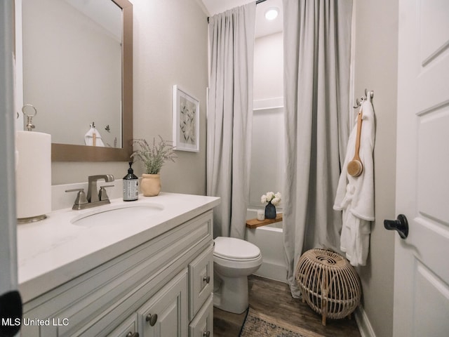 10501 Glade Cv, Gulfport, MS 39503 - full bath featuring vanity, shower / bath combination with curtain, and wood finished floors