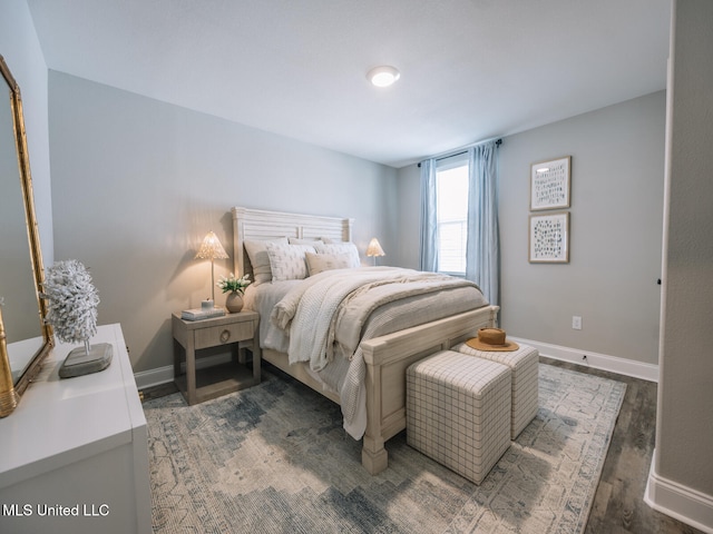 10501 Glade Cv, Gulfport, MS 39503 - bedroom with baseboards and wood finished floors