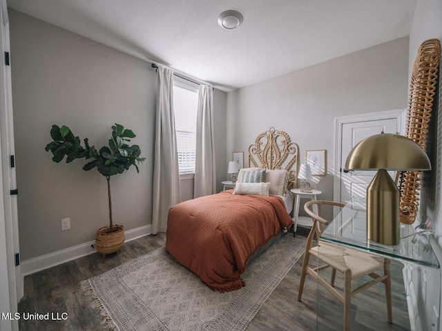 10501 Glade Cv, Gulfport, MS 39503 - bedroom with wood finished floors and baseboards