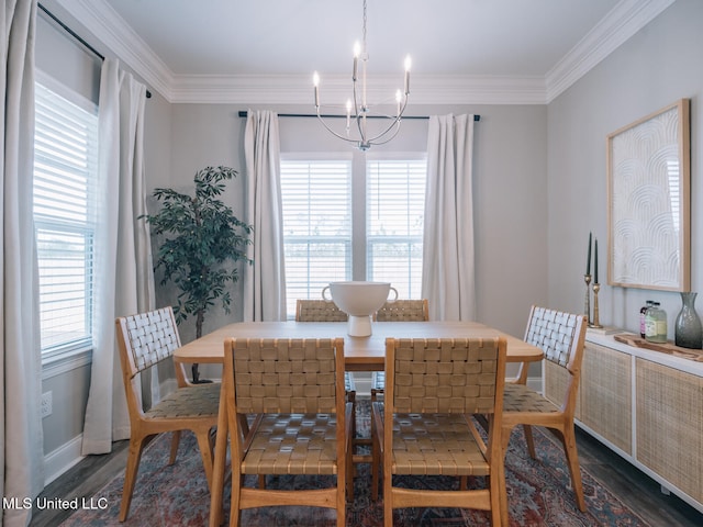 10501 Glade Cv, Gulfport, MS 39503 - dining space featuring a chandelier, wood finished floors, and crown molding