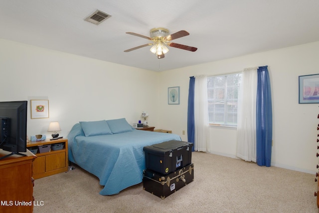 bedroom with light colored carpet and ceiling fan