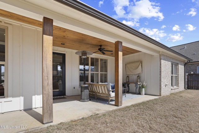 exterior space featuring a ceiling fan