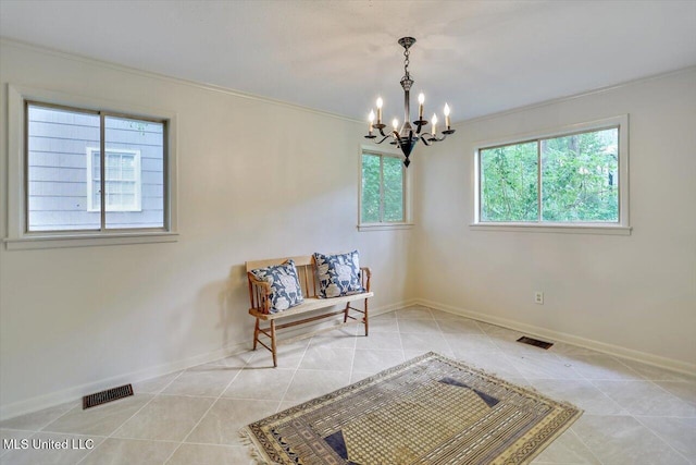 4638 Katherine Blvd, Jackson, MS 39211 - living area featuring a chandelier, light tile patterned floors, baseboards, and crown molding