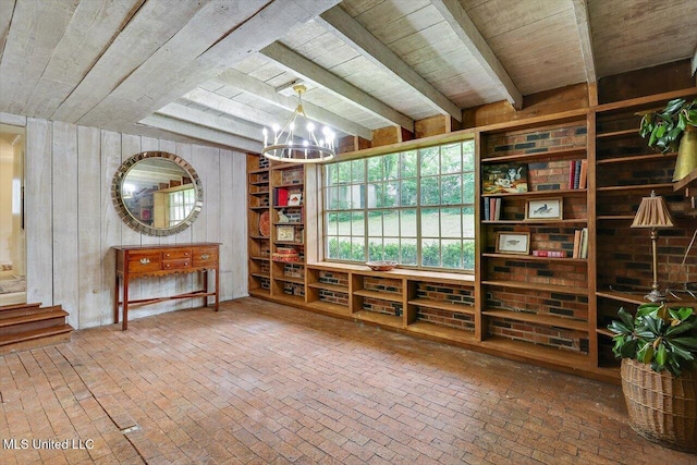 4638 Katherine Blvd, Jackson, MS 39211 - miscellaneous room featuring wood ceiling with exposed beams, a chandelier, wood walls, and brick floors