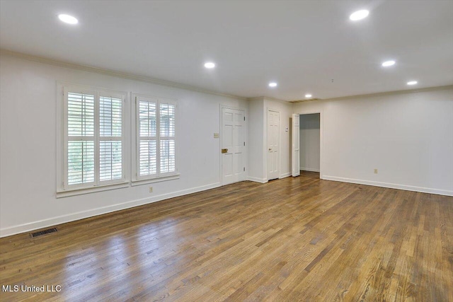 4638 Katherine Blvd, Jackson, MS 39211 - unfurnished room featuring ornamental molding, baseboards, wood finished floors, and recessed lighting