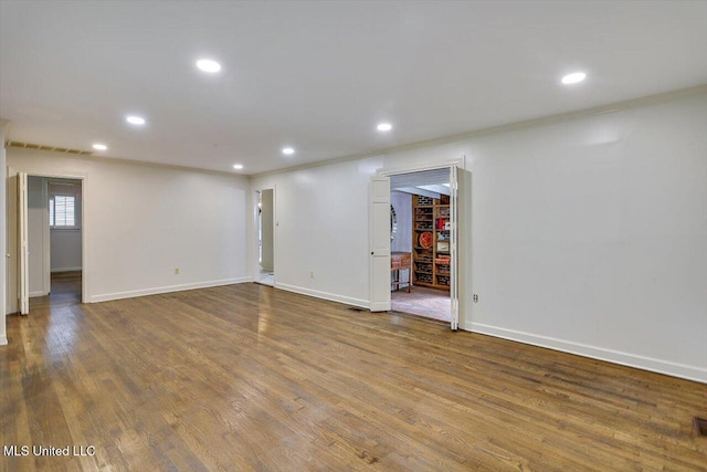 4638 Katherine Blvd, Jackson, MS 39211 - unfurnished room featuring recessed lighting, baseboards, wood finished floors, and ornamental molding