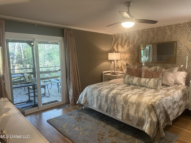 bedroom with crown molding, wood-type flooring, access to outside, and ceiling fan