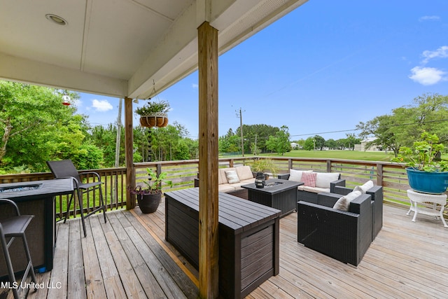 wooden deck featuring an outdoor hangout area