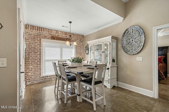 dining room with finished concrete flooring, visible vents, baseboards, brick wall, and ornamental molding