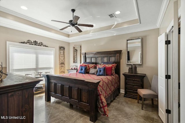 bedroom featuring a tray ceiling, recessed lighting, visible vents, ornamental molding, and ceiling fan