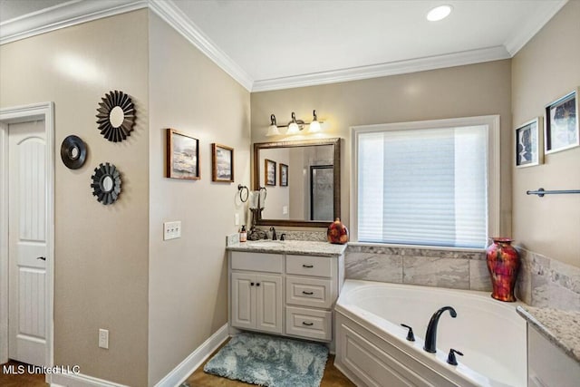 full bathroom featuring ornamental molding, a stall shower, a garden tub, and vanity