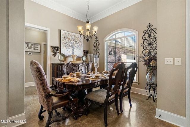 dining area with ornamental molding, a notable chandelier, and baseboards