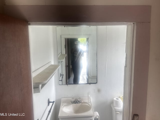 1003 41st Ave, Gulfport, MS 39501 - bathroom featuring toilet and vanity