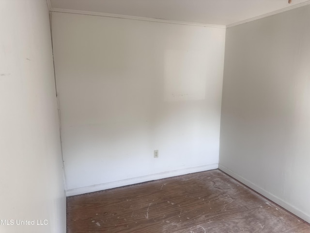 1003 41st Ave, Gulfport, MS 39501 - empty room featuring crown molding, baseboards, and wood finished floors