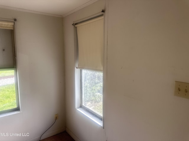1003 41st Ave, Gulfport, MS 39501 - spare room with healthy amount of natural light and ornamental molding