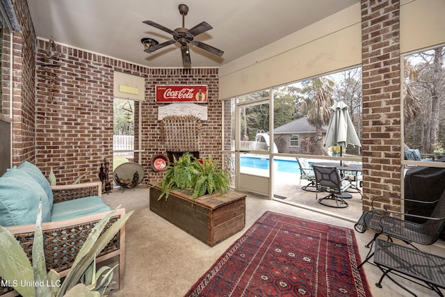 interior space featuring a ceiling fan and an outdoor pool