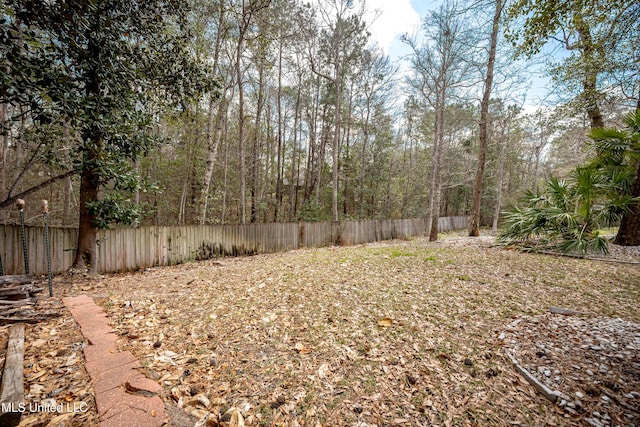 view of yard with fence