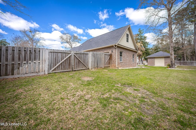 view of side of property featuring a fenced backyard, brick siding, and a lawn