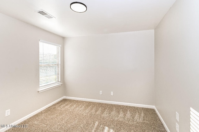 empty room with carpet floors