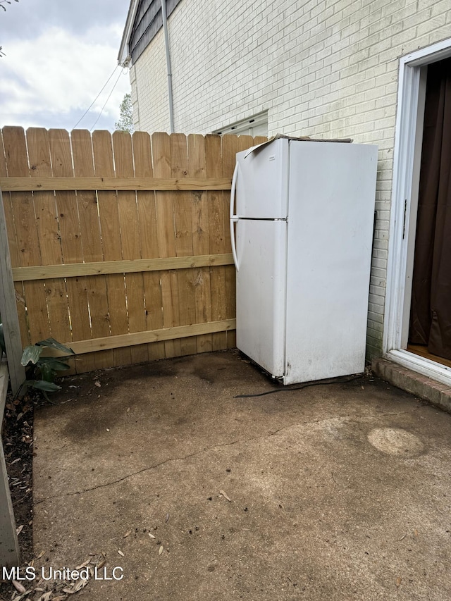 view of patio with fence