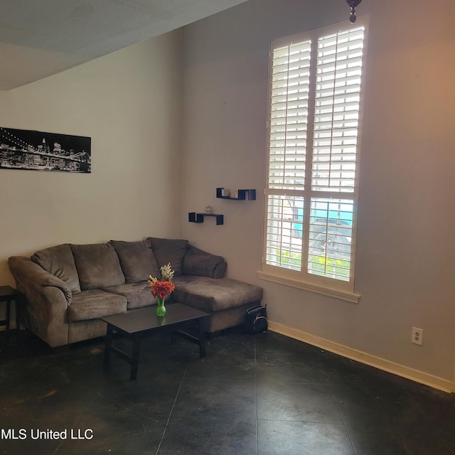 living room featuring baseboards