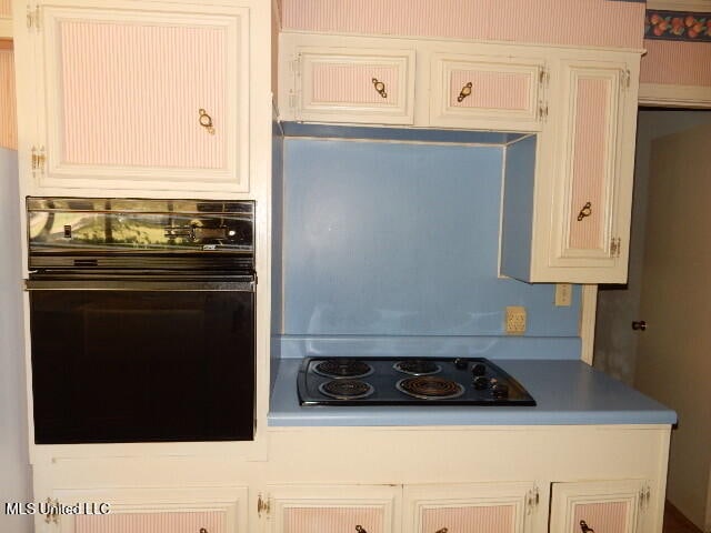 kitchen with black appliances