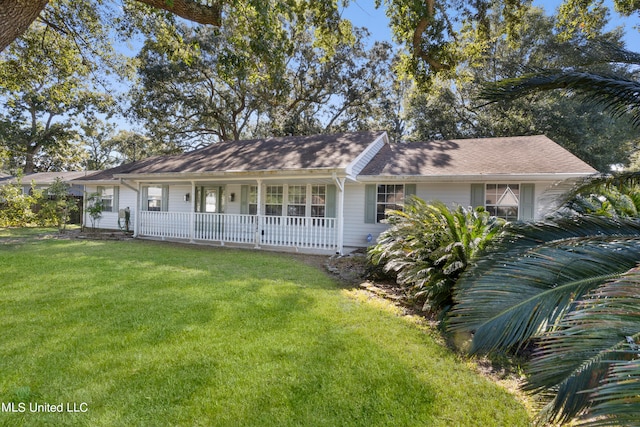 single story home featuring a front yard and covered porch