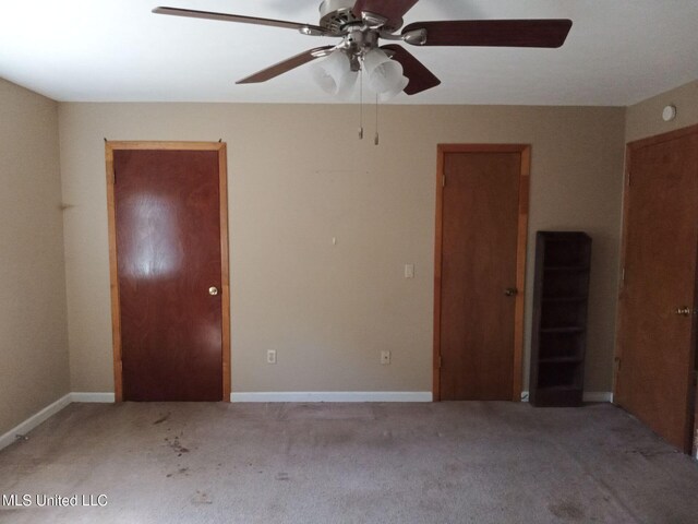 120 Harrison Ln, Yazoo City, MS 39194 - unfurnished room featuring carpet, a ceiling fan, and baseboards