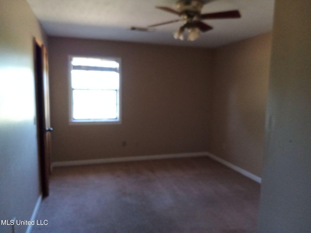 120 Harrison Ln, Yazoo City, MS 39194 - carpeted spare room featuring a ceiling fan and baseboards