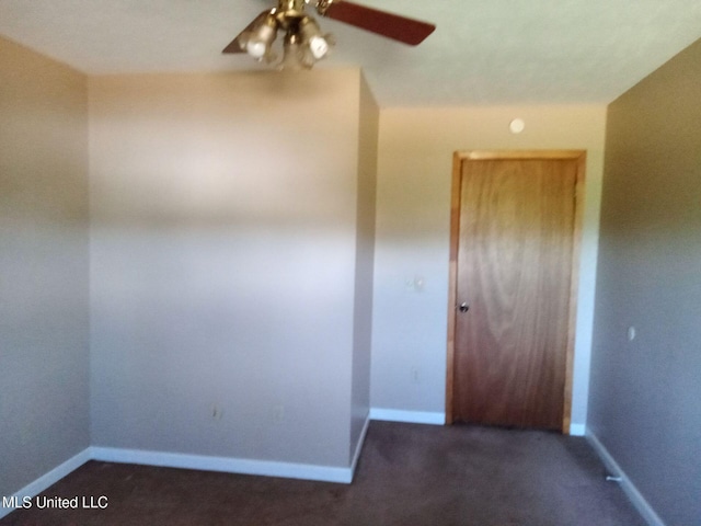 120 Harrison Ln, Yazoo City, MS 39194 - empty room featuring a ceiling fan, carpet, and baseboards