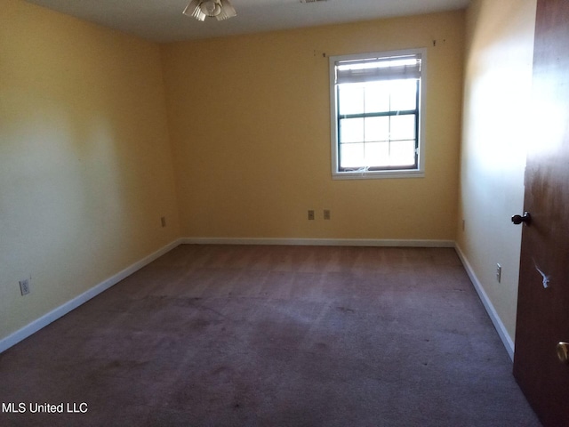 120 Harrison Ln, Yazoo City, MS 39194 - carpeted empty room with baseboards