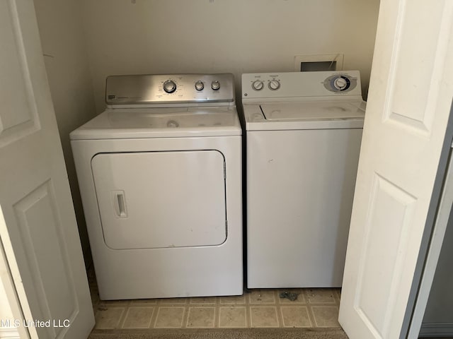 laundry area featuring separate washer and dryer