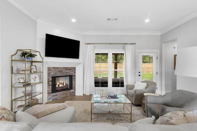 118 Seymour Dr, Madison, MS 39110 - living room featuring ornamental molding, a fireplace, wood finished floors, and recessed lighting
