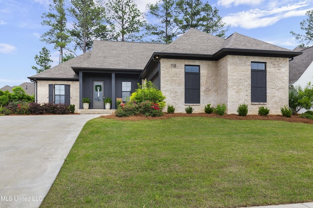 118 Seymour Dr, Madison, MS 39110 - french country home featuring roof with shingles, a front yard, and driveway