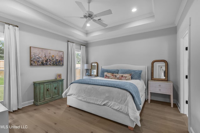 118 Seymour Dr, Madison, MS 39110 - bedroom featuring a raised ceiling, crown molding, wood finished floors, recessed lighting, and baseboards