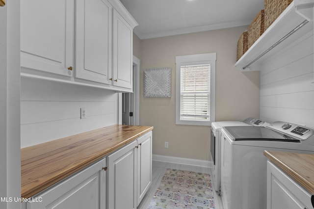 118 Seymour Dr, Madison, MS 39110 - laundry area featuring washer and dryer, cabinet space, baseboards, and crown molding