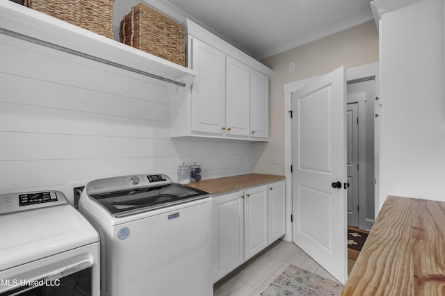 118 Seymour Dr, Madison, MS 39110 - laundry room featuring cabinet space and washer and dryer