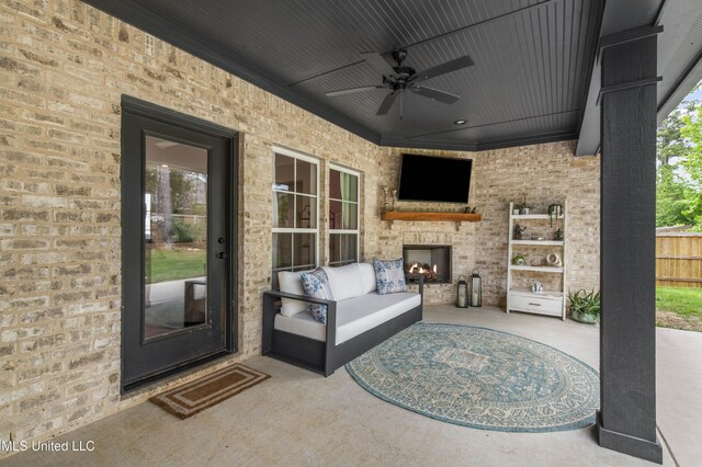 118 Seymour Dr, Madison, MS 39110 - view of patio / terrace featuring ceiling fan, a large fireplace, and fence